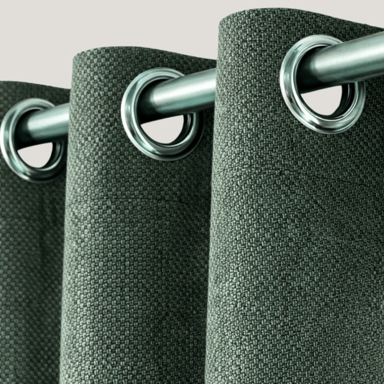 Evergreen dimout curtain JESSICA 140x290 cm with textured fabric and metal eyelets on a curtain rod.
