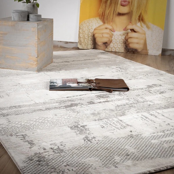 Modern cream carpet 160x230 with grey abstract pattern and soft textured finish