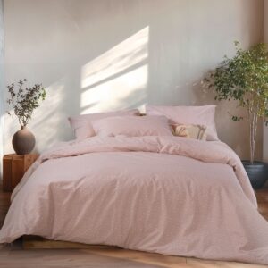 Queen size duvet cover set Sissy with matching pillowcases, shown on a styled bed setup.
