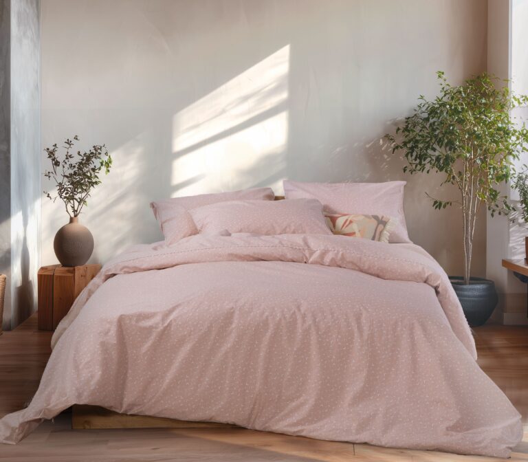 Queen size duvet cover set Sissy with matching pillowcases, shown on a styled bed setup.