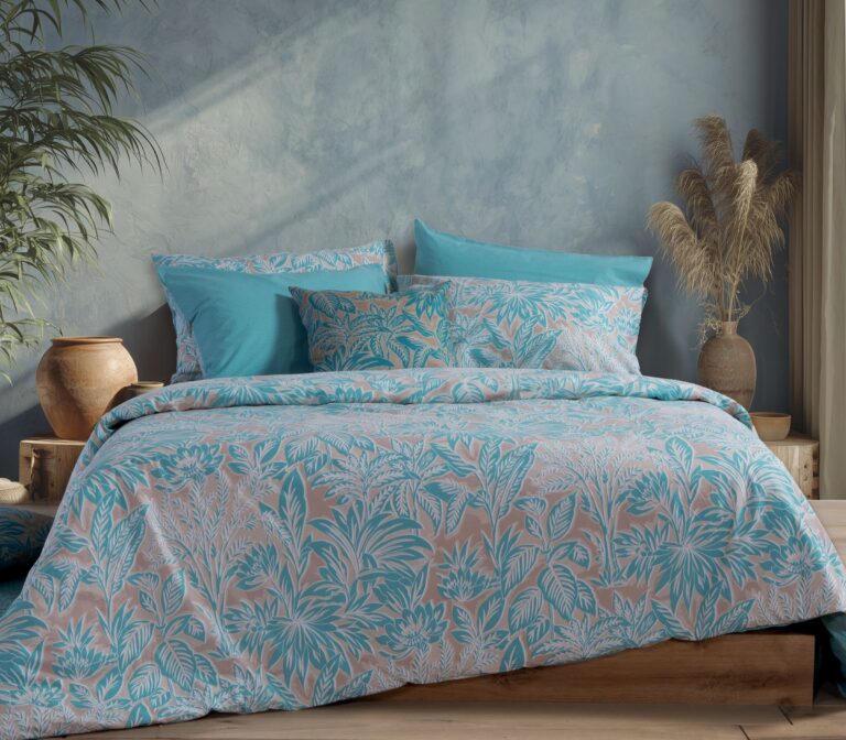 Single size fitted bedsheet set in Charisma Blue colour, made from soft cotton fabric with a smooth finish, featuring a solid blue design for a modern bedroom look.