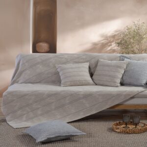 Bleeze sofa throw with a textured design, ideal for adding comfort and style to living spaces.
