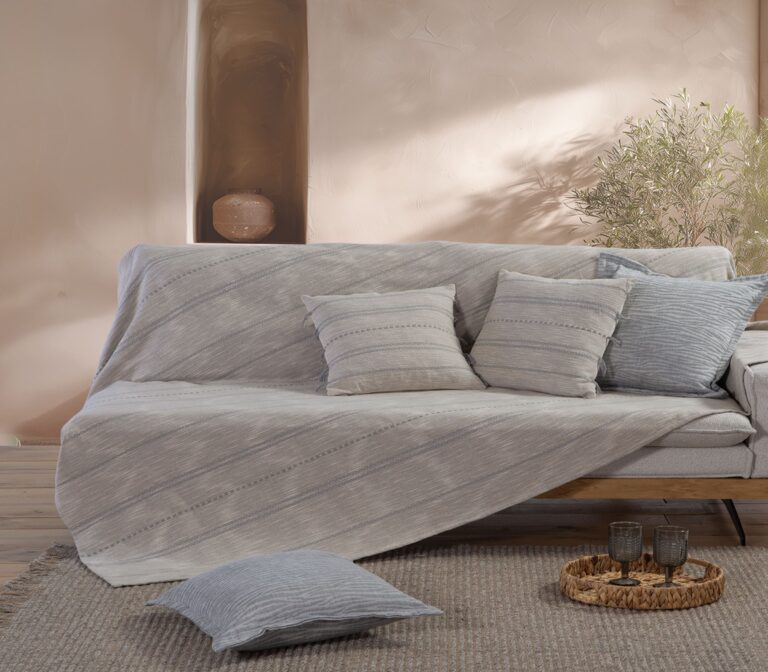 Bleeze sofa throw with a textured design, ideal for adding comfort and style to living spaces.