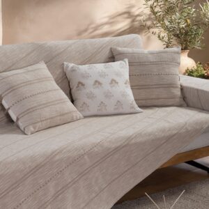 Bleeze sofa throw with a textured design, ideal for adding comfort and style to living spaces.