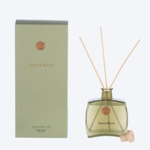 Serene Wood reed diffuser with eucalyptus, rosemary, pine, and cedarwood woody fragrance.