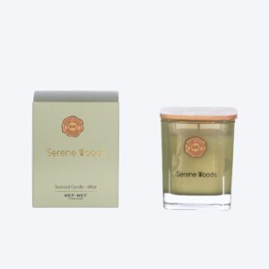 Scented candle with eucalyptus, rosemary, pine, and cedarwood woody fragrance.